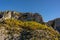 Rugged mountains in the Blanc-Martel trail in La Palud-sur-Verdon, France against a blue sky