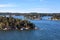 Rugged nature with wooded islands and rocky cliffs in Stockholm archipelago. Uninhabited islets, communities and ancient villages