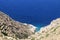 Rugged, steep cliffs and the Aegean sea, at the small Greek island of Sikinos.