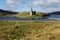 The Ruin of 16th Century Ardvreck Castle sat on a Rocky Promontory in Loch Assynt, Sutherland, Scotland, UK