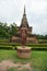 Ruin of Budda in front of a pagoda