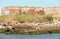 Ruin of a destroyed old brick home in the venetian lagoon