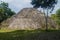 Ruin of a pyramid in an archaeological site Yaxha, Guatema