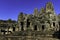 Ruin stone Ancient Bayon Temple with blue sky