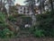 Ruined and abandoned hous with beautiful architecture in the Akarmara mining village in Abkhazia. Ghost city in the evening