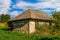 Ruined and abandoned rural house. The concept of a dying village and global urbanization. Background with copy space