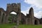 Ruined abbey walls and arches in Brecon Beacons in Wales