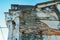 Ruined aged house wall structure see brick inside