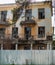 A ruined building with broken Windows