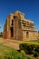 Ruined facade wall with sky of the ancient Brihadisvara Temple in Gangaikonda Cholapuram, india.