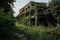 ruined factory with broken and twisted metal, surrounded by overgrown vegetation