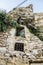 Ruined house excavated in the mountain in Ragusa, Sicily, Italy
