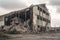 ruined industrial building with broken windows and collapsed roof surrounded by debris