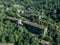 Ruined lost overgrown mining ghost town Akarmara, consequences of war in Abkhazia, aerial view from drone