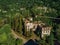 Ruined lost overgrown mining ghost town Akarmara, consequences of war in Abkhazia, aerial view from drone