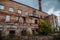 Ruined red brick industrial building. Abandoned and destroyed sugar factory in Novopokrovka, Tambov region