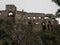 The ruined ruins of Beckov Castle stand on a steep 50 m high cliff in the village of Beckov near the river VÃ¡h