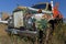 Ruined rusty old vintage truck in countryside