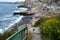 Ruined sidewalk to fishing huts on the coast