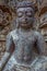 Ruined statue in heritage Buddhist excavated site Ratnagiri meaning hill