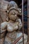 Ruined statue in heritage Buddhist excavated site Ratnagiri meaning hill