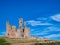 The ruins of the 14th-century fortification of Dunstanburgh Castle on the Northumberland coast in the north east UK