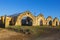 Ruins of abandoned loading bays for trucks and railway at Sao Do