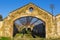 Ruins of abandoned loading bays for trucks and railway at Sao Do