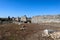 Ruins of the ancient agora at archaeological site Aspendos in Turkey under clear blue spring sky