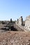 Ruins of the ancient agora at archaeological site Aspendos in Turkey under clear blue spring sky