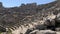 Ruins of an ancient amphitheater. Roman amphitheater in Turkey.Ancient stones of the excavated historic city. Turkey, Fetiya,