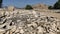 Ruins of an ancient amphitheater. Roman amphitheater in Turkey.Ancient stones of the excavated historic city. Turkey, Fetiya,