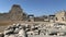 Ruins of an ancient amphitheater. Roman amphitheater in Turkey.Ancient stones of the excavated historic city. Turkey, Fetiya,