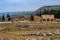 The ruins of the ancient ancient city of Hierapolis with columns, gates and graves in Pamukalle