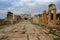 The ruins of the ancient ancient city of Hierapolis with columns, gates and graves in Pamukalle