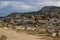 The ruins of the ancient ancient city of Hierapolis with columns, gates and graves in Pamukalle