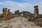 The ruins of the ancient ancient city of Hierapolis with columns, gates and graves in Pamukalle