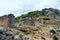 Ruins of ancient bridge in mountains