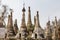 Ruins of ancient Burmese Buddhist pagodas Nyaung Ohak in the village of Indein on Inlay Lake