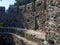 Ruins of an ancient castle. At the archaeological site. Ruined Palace Museum. Fortress Gonio. The architecture of antiquity.