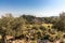 Ruins of an ancient city with Greek style theatre at the archaeological site of Pinara in Turkey.