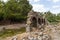 Ruins of the ancient city of Olympos in Cirali village in Antalya, Turkey. Local and foreign tourists come to visit the ancient ci