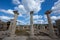 Ruins of ancient Ephesus with grand columns under clear blue sky