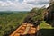 The ruins of an ancient fortress on the famous Lion Mountain - Sigiriya, Sri Lanka.