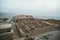 Ruins of the ancient fortress of Massada on the mountain near the dead sea in southern Israel. Top view of aged buildings built