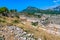 Ruins of an ancient fortress on a mountain in the vicinity of the city of Sutomore Montenegro. Golo brdo. Mountains.