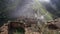 Ruins of ancient Gamsutl village with abandoned building stone walls at the top of the mountain peak