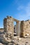 Ruins of an ancient Greek temple against the background of the Vladimir Cathedral in Chersonesos