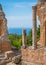 Ruins of the Ancient Greek Theater in Taormina with the sea in the background. Province of Messina, Sicily, southern Italy.