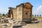 The ruins of the ancient Hierapolis city next to the travertine pools of Pamukkale, Turkey. Tomb.